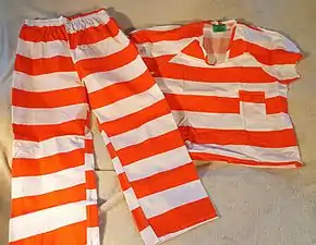 Prison uniforms are often orange.