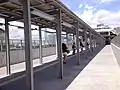 Covered walkway to the pier in September 2014