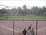 Softball action at Crosby Memorial Park