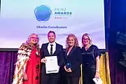 Aaron Rees (DWC Marketing and Communications Manager) and Dame Julie Christie (DWC Trustee) at the 2022 PRINZ Awards.