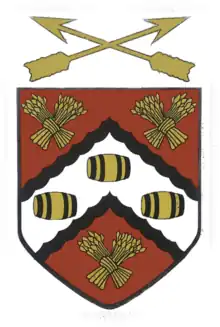 Logo of the school in red, white, black and gold, and features hops and three barrels