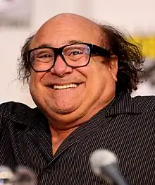 Close up of Danny Devito smiling at the 2010 San Diego Comic-Con