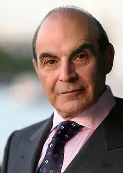 Sir David Courtney Suchet