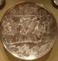 Multiple silver plates which display key parts of the early life of David