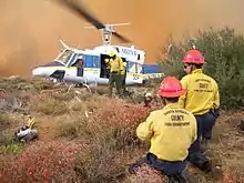 Santa Barbara County hand crew and a Bell 212 on the Day Fire. USFS photo by Jim Akerman