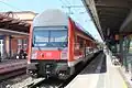 2. Generation Doppelstockwagen in DB Verkehrsrot [de] colours on a Rostock S-Bahn service (July 2013)