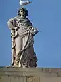 Statue of Demeter above Corn Exchange facade