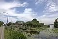 The landscape with wide waters and narrow roads in the hamlet of Demmerik in Vinkeveen Gem De Ronde Venen.