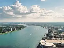 Detroit and adjacent Windsor Canada separated by the Detroit River, as seen from the GM Renaissance tower