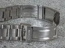 Stainless steel bracelet with deployant clasp and diver's extension.