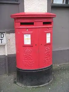 Modern Royal Mail branded EiiR Type C double aperture pillar box, Menai Bridge.