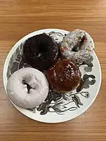 Doughnuts on a plate in Brooklyn, New York City, New York.