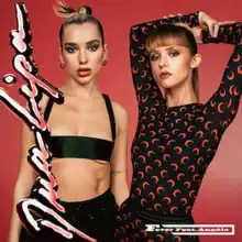 Dua Lipa standing in a black outfit with her hair tied up next to Angèle who poses with her hands above her head and wears a black dress with red moons and her hair in a ponytail. They stand on a red background, with Lipa's name written in red vertically on the left, and the title "Fever feat Angèle" written in white in the bottom right.