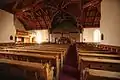 Interior of the church and its pews.