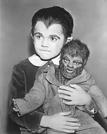 Eddie Munster with his werewolf doll "Woof-Woof"