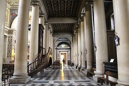 Collateral aisle behind the pulpit