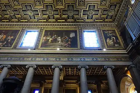 Upper walls of the nave lined with paintings