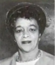 A black-and-white photograph of an African-American woman's face, from 1963.