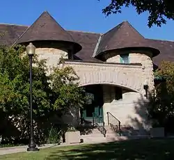 Entrance to the George C. Walker Library. The building and many of the books the library contained when it opened were a gift of George C. Walker, then president of the Blue Island Land and Building Company (his predecessor being F.H. Winston, a prominent Chicago attorney).  The original portion of the building was designed by Charles Sumner Frost and cost $12,000.  It opened on April 22nd, 1890, was expanded by an addition that quadrupled its space in 1929, and received a major renovation in 1995.