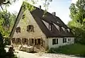 Old farmhouse in the street "Gründlacher Straße"