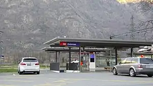 Canopy-covered platform with mountains in the distance