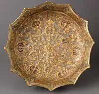 "Faceted Basin", with gilding over the pattern raised in slip. After 1200.