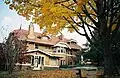 Exterior of the Mackin House in the fall