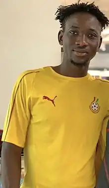 Photo of a football player in kit