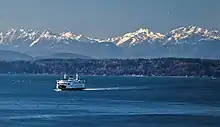 Ferry on Puget Sound. Left to right: Mt. Pershing, Jefferson Peak, Mt. Cruiser, Mt. Skokomish, Mt. Stone