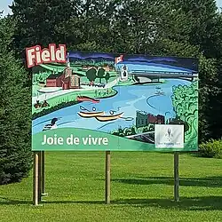 A welcome sign in Field