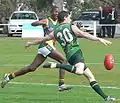 Irish player gets a kick downfield