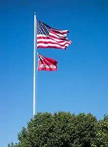 The flag of Taunton flies alongside the flag of the United States over Taunton Green