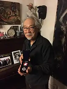 Photograph of Flavio-Shiró receiving the Order of the Rising Sun from the Japanese Government.