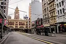 The Elizabeth Street tram terminus and Flinders Street station.