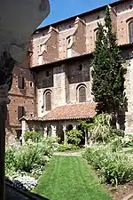 The Romanesque walls of the collegiate of Saint Salvy