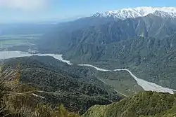 Franz Josef (middle left), next to the Waiho River, as seen from Alex Knob