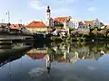 View of the old town center from a bridge over the river Mur