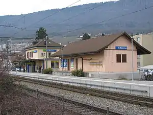 Two-story building with hip roof