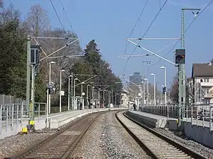 Double-tracked railway line with side platforms