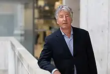 Gerald Joyce standing on the Salk Institute campus