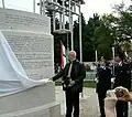 Göran Lindblad hands over the carved text of Resolution 1481 (2006)