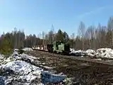 Locomotive TU4-818 with freight train