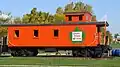 A restored GTW wood caboose on display at Lake Odessa, Michigan