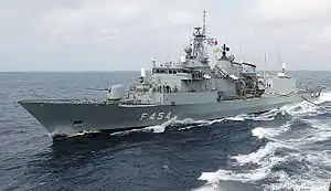 A view from USS Seattle, showing HS Psara underway conducting a replenishment at sea in 2002