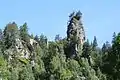 The rocky outcropping above the village