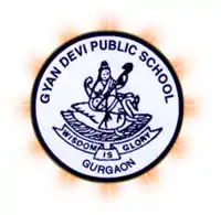 Saraswati, the Goddess of education, surrounded by the school name and its motto