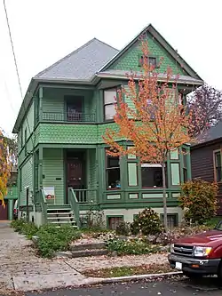 Photograph of the Keck House, a two-story, wooden house