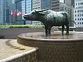 A water buffalo by English sculptor Elisabeth Frink stands in Exchange Square