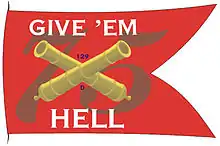 Battle flag with red background with the number 75, crossed canon barrels and phrase "Give 'em Hell"