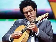 Brazilian Mandolin virtuoso Hamilton de Holanda playing a ten-string bandolim